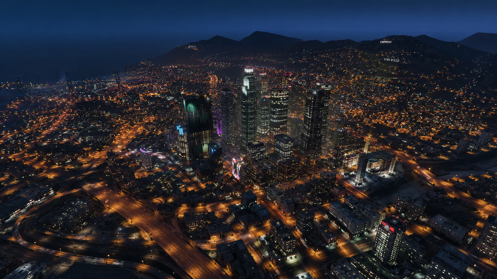 Aura City skyline and illuminated streets at night